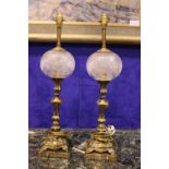 A PAIR OF BRASS METAL LAMPS, with cut glass globe decoration, electric, no shades, 24" tall approx