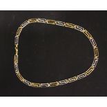 A 9CT YELLOW & WHITE GOLD NECKLACE, zigzag design, link form