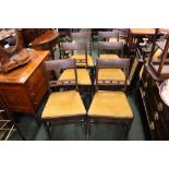A GOOD SET OF 6 REGENCY DINING ROOM CHAIRS, with reeded frame, having a ebonised string inlaid crest