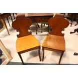 A FINE PAIR OF IRISH REGENCY HALL CHAIRS