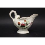 AN EARLY WORCESTER CREAMER, shell shaped body, with floral design, circa 1760