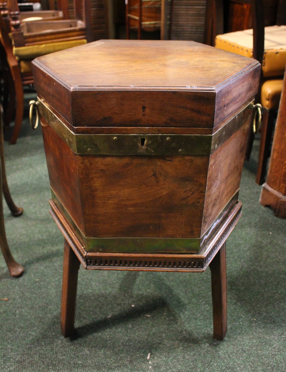 A GOOD BRASS BOUND CELLARETTE/WINE COOLER, Hexagonal in shape