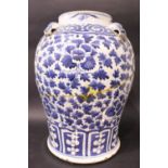A LARGE BLUE & WHITE JAR, with lion head shoulder decorations, and floral & foliage decoration all