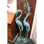 A PAIR OF ORNAMENTAL GARDEN HERONS/BIRDS