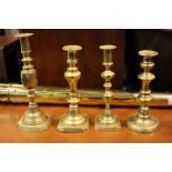 A COLLECTION OF 4 BRASS CANDLE STICKS, various designs