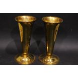 A PAIR OF HEAVY CAST METAL VASES, gilt coloured, 9" tall, 4" wide at top, 5" wide at base