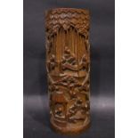 A 19TH CENTURY CHINESE BAMBOO BRUSH HOLDER, finely carved decoration showing foresters, and