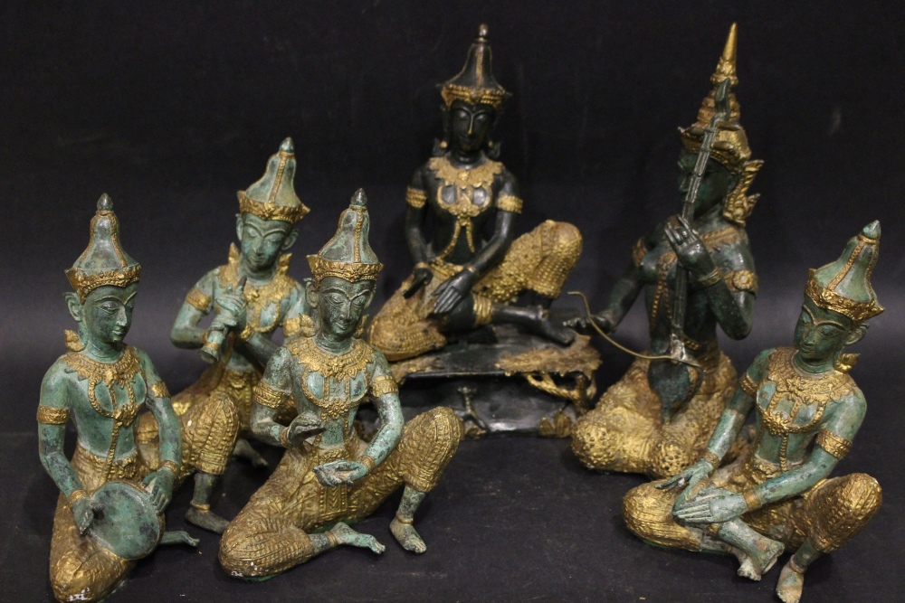 A COLLECTION OF TIBETAN MUSICAL FIGURES, each playing an instrument, bronze & gilt highlights