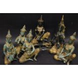 A COLLECTION OF TIBETAN MUSICAL FIGURES, each playing an instrument, bronze & gilt highlights