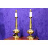 PAIR OF LARGE EARLY 20TH CENTURY BRASS COLUMN LAMPS, having fluted decoration and turned base, 24"
