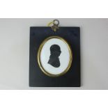 Miers and Field (c.1800), an oval silhouette profile portrait of a young man, on plaster, Miers &