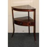 A 19th century mahogany bow front corner washstand with one short and two dummy drawers, 62cm