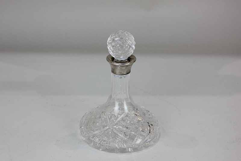 A modern silver mounted small glass ship's decanter with stopper, Birmingham 1980, 15cm