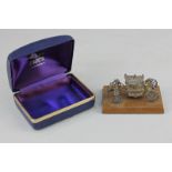 An Elizabeth II silver miniature coronation carriage, maker Toye, Kenning & Spencer, Birmingham,