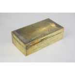 A George VI silver gilt cigarette box, rectangular shape with engine turned decoration, and