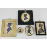 Four bronzed silhouette profile portraits of young ladies and a gentleman, two with inscribed labels