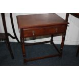 A rectangular mahogany side table with turned legs and low uniting stretcher on turned feet, 56cm