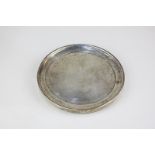 A George III silver circular coaster on loaded base, marks indistinct, London 1805, 14cm