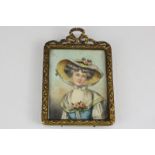 A 19th century miniature portrait of a lady, Madame de Berny, indistinctly signed J. P. ?, in glazed