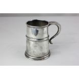 A George V silver mug, tapered form with girdle and scroll handle, maker John Dixon, Sheffield 1932,