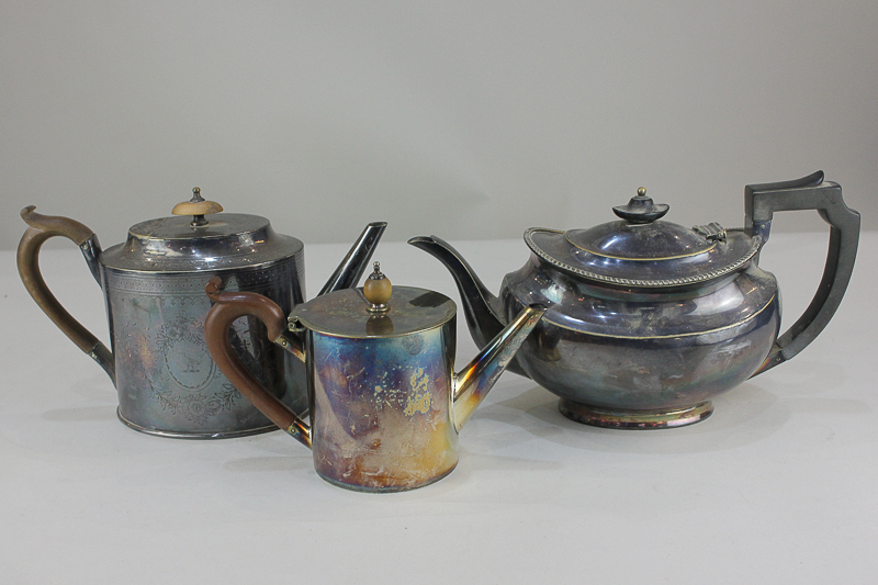 A silver plated Windsor Bishop, Norwich teapot, together with another silver plated teapot with