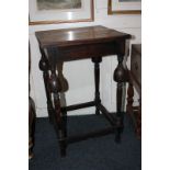An oak occasional table with square top, on trumpet turned legs with uniting stretcher, 46cm