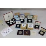 A Royal Mint 1984-1987 United Kingdom one pound silver proof coin collection, boxed, together with