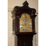 A Camerer & Cuss, London, mahogany longcase clock with 12 inch arched dial, with chime / silent