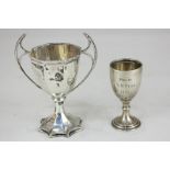 A George V silver trophy cup, maker Stevenson & Law, Sheffield, 1923, of octagonal form with twin