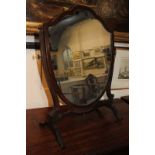 A mahogany shield shape dressing table mirror, 65cm high