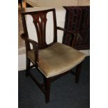 A mahogany carver dining chair, with central pierced back splat and upholstered seat, on chamfered