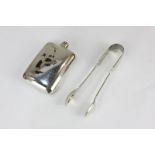 An Edward VII silver hip flask (lid missing), and a pair of silver plated sugar tongs
