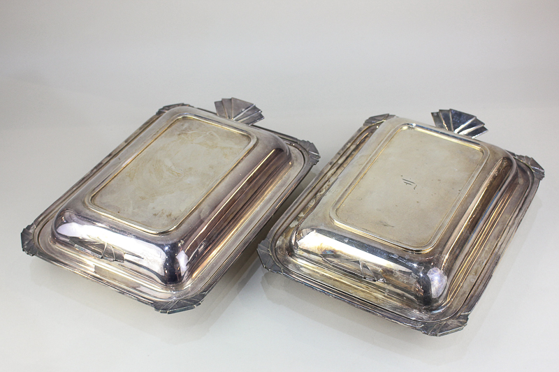 A pair of Art Deco silver plated tureens and covers, rectangular form with fan shaped handles,