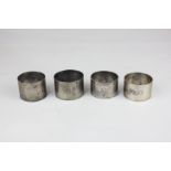 Four various silver napkin rings with engraved initials, 6.5oz