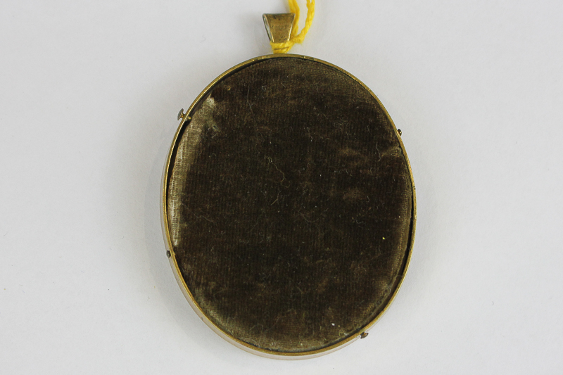 A late 18th/ early 19th century oval miniature portrait of a gentleman, in white necktie and black - Image 2 of 2