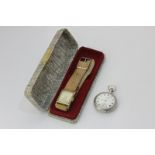 A gilt and steel wristwatch by Favre Leuba, circa 1935, a lady's silver Omega fob watch