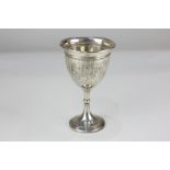 A George V silver goblet on knapped stem and circular base, maker Barker Brothers, Birmingham