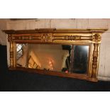 A giltwood and gesso rectangular three-panel over mantel mirror with moulded break front cornice and