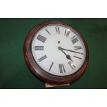 A mahogany cased circular wall dial Station / School clock, the 30cm white enamel dial with Roman