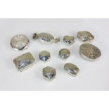 A collection of ten modern 925 silver pill boxes, various shapes including one in the form of a