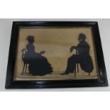 Augustin Edouart (1789-1861), silhouette profile portrait of a seated couple, inscribed Aug. Edouart