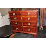 A small banded mahogany chest of two short over three long drawers, on bracket feet, 51cm