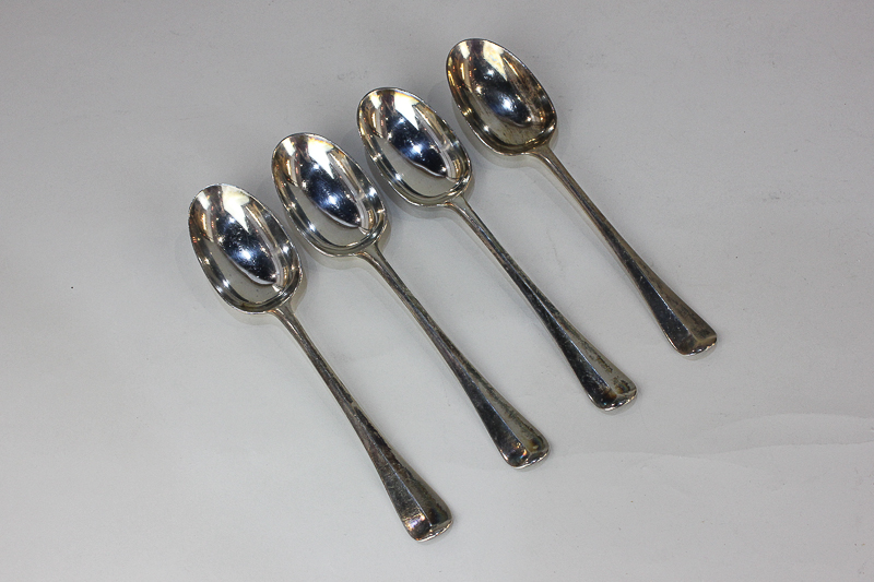 A set of four George V silver Old English pattern tablespoons with rattail bowls, maker David