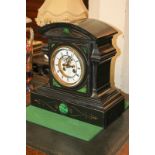 A Victorian slate mantel clock with gilt metal and enamel dial, marked Glading, Brighton, in