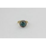 A blue zircon and eight-cut diamond cluster ring on 18ct gold