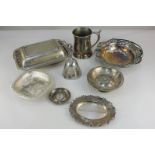 A group of silver plated wares including a rectangular entree dish, a tankard, three dishes and a