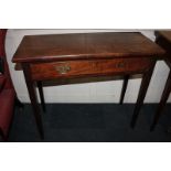 A George III mahogany side table, with rectangular top and drawer, on square tapered legs, 86.5cm (