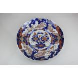 A Japanese Imari porcelain charger decorated with central circular panel of flowers, 30.5cm
