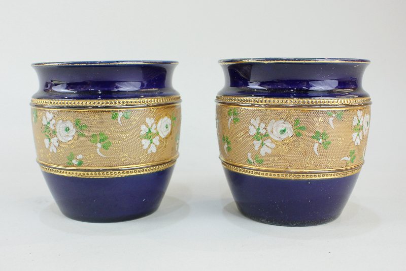 A pair of Royal Doulton Slaters pottery vases of floral and gilt design, 9.5cm diameter