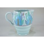 A Clarice Cliff Newport pottery jug with floral frond design on pale blue ground, 19cm high